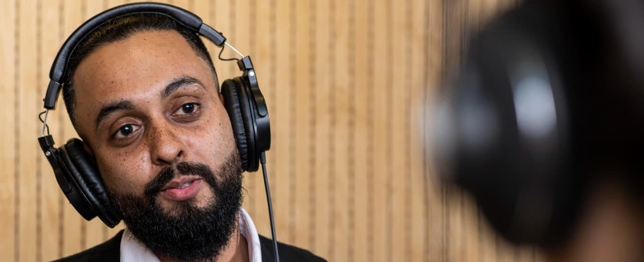 Image of guest discussing in the studio